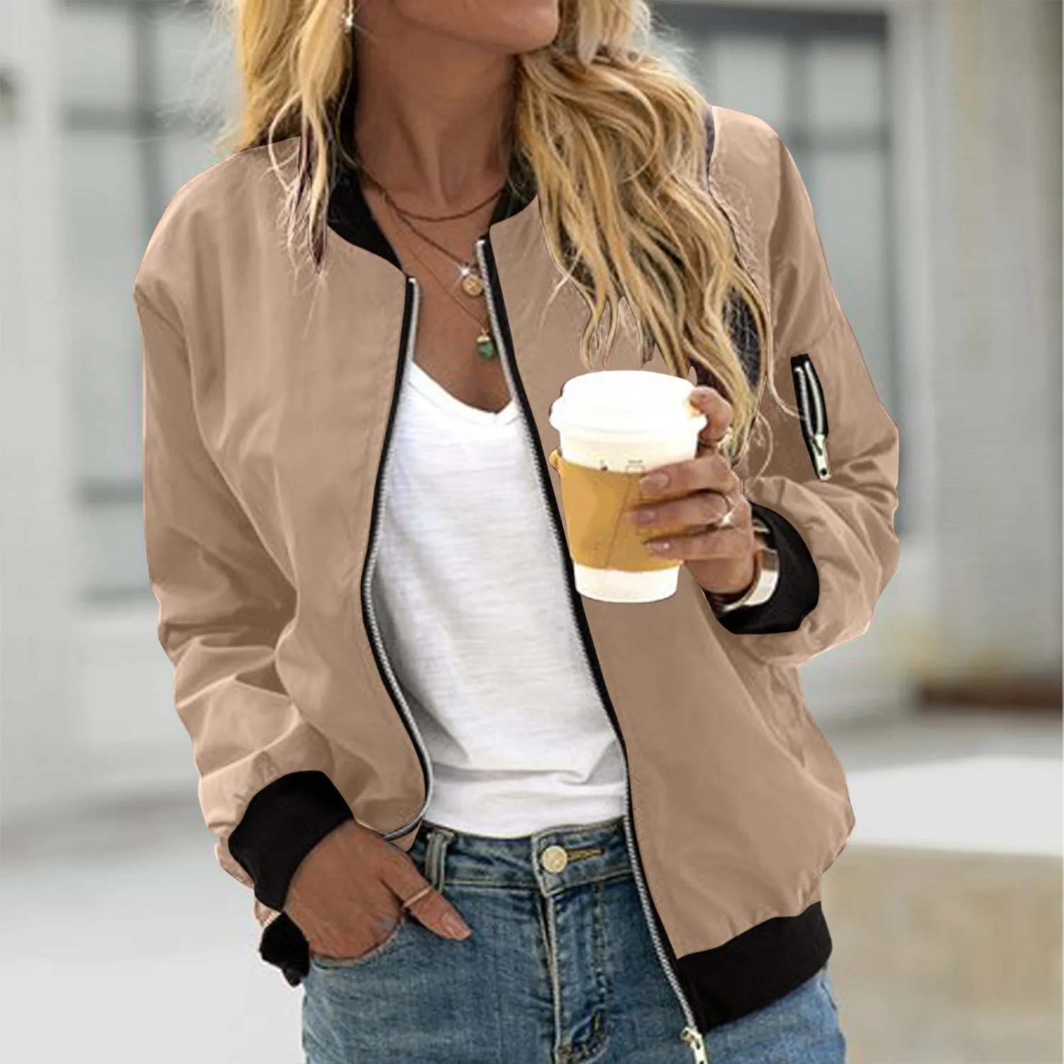 Lightweight bomber jacket featuring zip pockets and a stylish ribbed design, perfect for casual wear for both men and women. 2