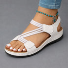 Lightweight orthopedic sandals for women featuring a cushioned footbed and adjustable straps, designed with a modern strappy look for comfort and style. 3