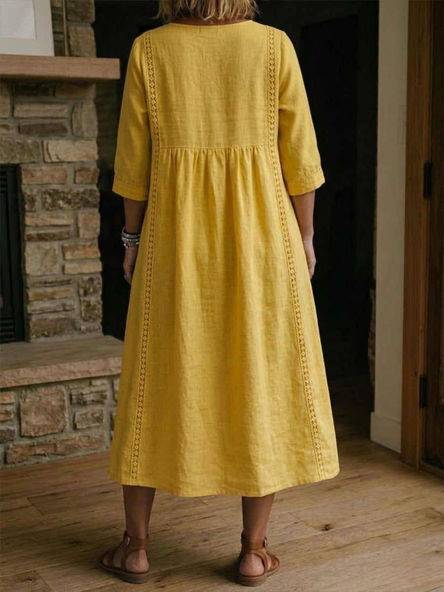Linen midi dress featuring a V-neck and delicate lace trim, designed in a relaxed A-line silhouette, perfect for summer wear for women. 2