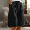 Linen shorts with elastic waist and deep side pockets, featuring a breathable relaxed fit perfect for both men and women. 10