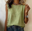 Linen tank top featuring a casual sleeveless design and stylish button side detail, perfect for summer outfits. 1