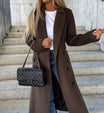 Long wool coat for women featuring a double-breasted design in classic black, tailored fit for a stylish and sophisticated look. 0