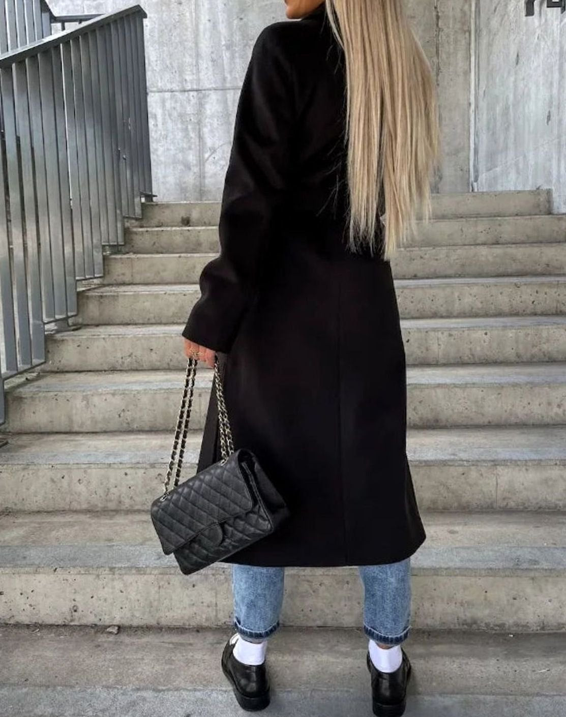 Long wool coat for women featuring a double-breasted design in classic black, tailored fit for a stylish and sophisticated look. 4