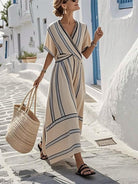 Maxi summer dress featuring a relaxed fit and soft blend fabric, perfect for women seeking a flattering and versatile style for warm weather occasions. 1