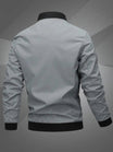 Men's black polyester bomber jacket featuring a zip-up front, baseball collar, and stylish embroidered detail. 0