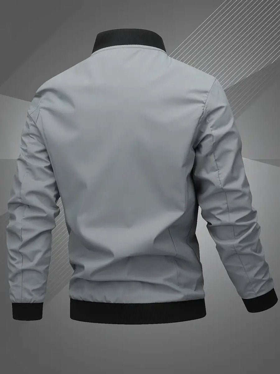 Men's black polyester bomber jacket featuring a zip-up front, baseball collar, and stylish embroidered detail. 0