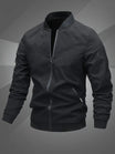 Men's black polyester bomber jacket featuring a zip-up front, baseball collar, and stylish embroidered detail. 2