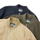 Men's black bomber jacket featuring a zip front closure and baseball collar, designed for a relaxed fit, perfect for casual wear. 6