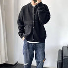 Men's black cardigan featuring a button-up front, patch pockets, and a relaxed fit knit design, perfect for casual wear and layering. 4