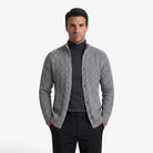 Men's black wool cardigan featuring a warm cable knit design and button closure, perfect for autumn and winter layering. 0