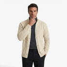 Men's black wool cardigan featuring a warm cable knit design and button closure, perfect for autumn and winter layering. 6