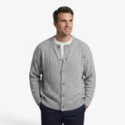 Men's cardigan featuring a button closure and cable knit design, designed for a casual loose fit, perfect for timeless knitwear styling. 0
