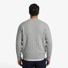 Men's cardigan featuring a button closure and cable knit design, designed for a casual loose fit, perfect for timeless knitwear styling. 1