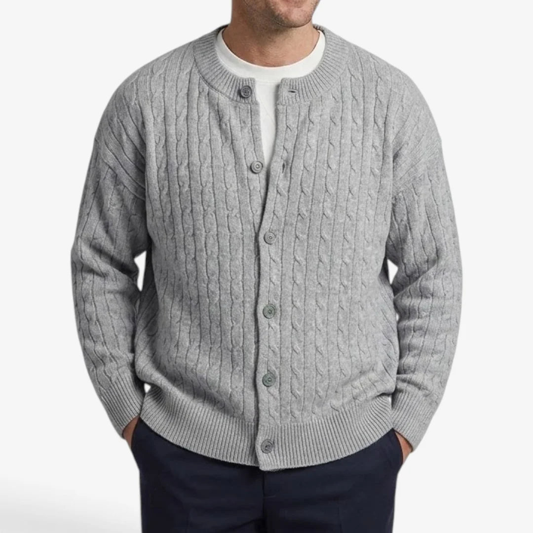 Men's cardigan featuring a button closure and cable knit design, designed for a casual loose fit, perfect for timeless knitwear styling. 2