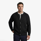 Men's cardigan featuring a button closure and cable knit design, designed for a casual loose fit, perfect for timeless knitwear styling. 3