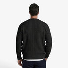 Men's cardigan featuring a button closure and cable knit design, designed for a casual loose fit, perfect for timeless knitwear styling. 4