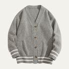 Men's cardigan with button front and V-neck design, featuring a soft knit texture, available in grey, cream, charcoal, and rust brown for a 0