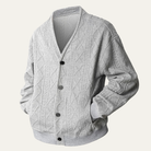 Men's V-Neck Cardigan with Button Front in soft cable knit, perfect for a cozy fit, available in black, grey, and white. 1