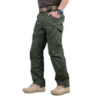 Men's black cargo pants featuring multiple pockets and reinforced seams, designed for hiking and outdoor activities. 3