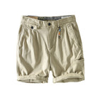 Men's cargo shorts featuring spacious pockets, made from lightweight breathable cotton, perfect for summer casual wear. 0