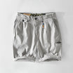 Men's cargo shorts featuring spacious pockets, made from lightweight breathable cotton, perfect for summer casual wear. 1
