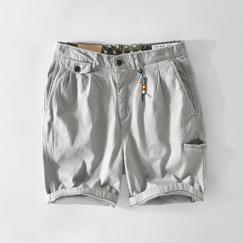Men's cargo shorts featuring spacious pockets, made from lightweight breathable cotton, perfect for summer casual wear. 1