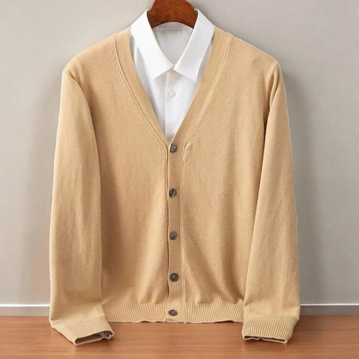 Men's cashmere cardigan in soft black featuring a button-up front and elegant V-neck design, perfect for stylish layering and comfort. 0