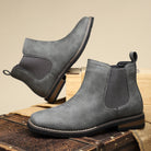 Men's tan faux leather Chelsea boots featuring elastic side panels and western stitching, perfect for stylish casual wear. 8