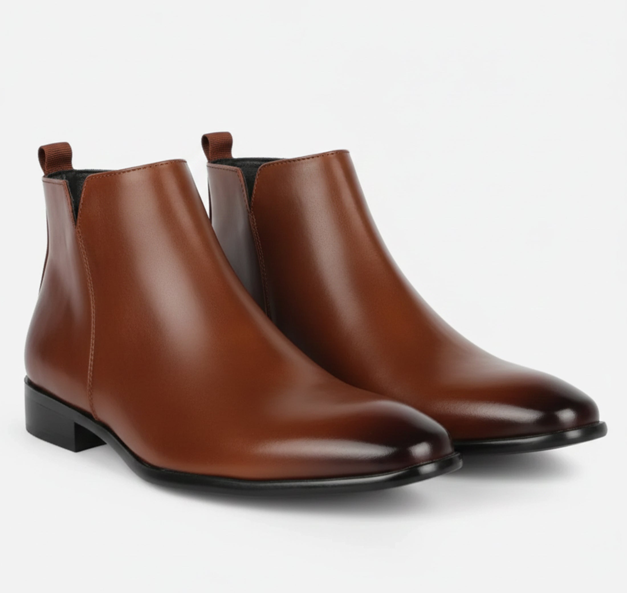 Men's Chelsea boots featuring a sleek squared toe design and a polished finish, perfect for stylish and sophisticated footwear options. 0