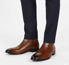Men's Chelsea boots featuring a sleek squared toe design and a polished finish, perfect for stylish and sophisticated footwear options. 1