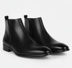 Men's Chelsea boots featuring a sleek squared toe design and a polished finish, perfect for stylish and sophisticated footwear options. 4