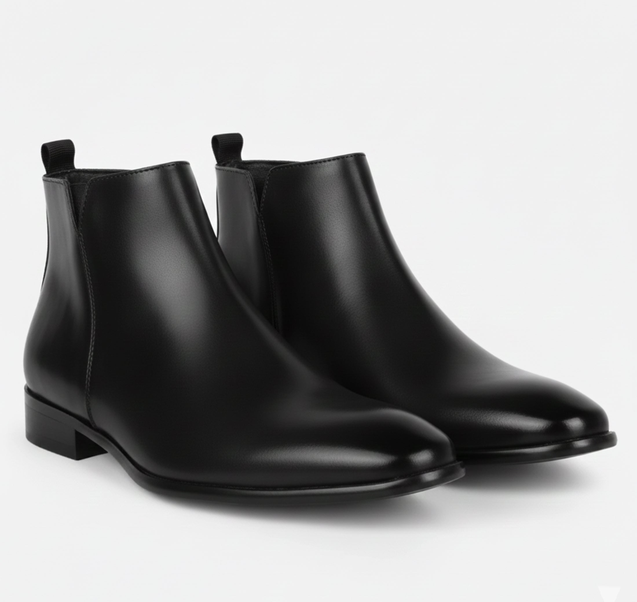 Men's Chelsea boots featuring a sleek squared toe design and a polished finish, perfect for stylish and sophisticated footwear options. 4