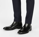 Men's Chelsea boots featuring a sleek squared toe design and a polished finish, perfect for stylish and sophisticated footwear options. 5