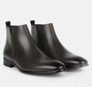 Men's Chelsea boots featuring a sleek squared toe design and a polished finish, perfect for stylish and sophisticated footwear options. 6