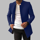 Men's collarless black wool overcoat featuring an open front design and a slim fit silhouette, perfect for a stylish and modern look. 1