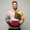 Men's colourblock hoodie featuring an adjustable hood and kangaroo pocket, crafted from a comfortable cotton blend for casual wear. 0