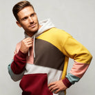 Men's colourblock hoodie featuring an adjustable hood and kangaroo pocket, crafted from a comfortable cotton blend for casual wear. 1