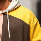 Men's colourblock hoodie featuring an adjustable hood and kangaroo pocket, crafted from a comfortable cotton blend for casual wear. 5