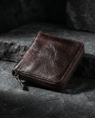 Men's cowhide leather zip wallet featuring a slim profile, durable design, and compact size, perfect for everyday use. 5
