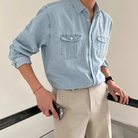 Men's denim long sleeve shirt featuring twin chest pockets and a washed finish, designed for a regular fit, perfect for casual and stylish outfits. 3