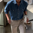 Men's denim long sleeve shirt featuring twin chest pockets and a washed finish, designed for a regular fit, perfect for casual and stylish outfits. 4