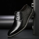 Men's black lace-up dress shoes featuring a comfortable fit and timeless design, perfect for formal occasions and professional settings. 0