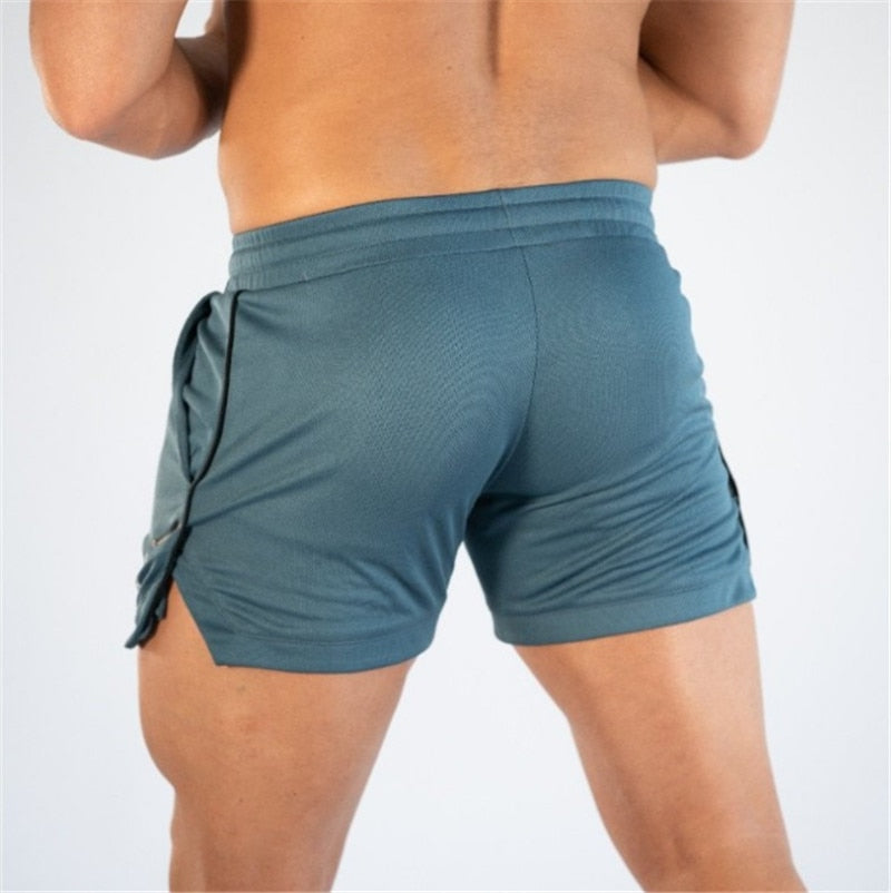 Men's mid waist polyester gym shorts featuring a drawstring closure for a comfortable fit, perfect for athletic activities and workouts. 5