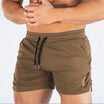 Men's mid waist polyester gym shorts featuring a drawstring closure for a comfortable fit, perfect for athletic activities and workouts. 6