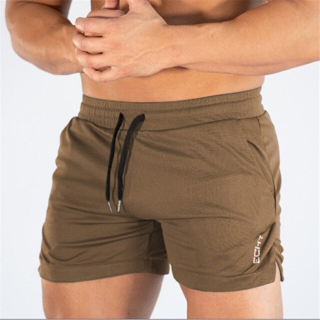 Men's mid waist polyester gym shorts featuring a drawstring closure for a comfortable fit, perfect for athletic activities and workouts. 6