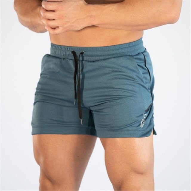 Men's mid waist polyester gym shorts featuring a drawstring closure for a comfortable fit, perfect for athletic activities and workouts. 8