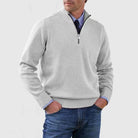 Men's half zip sweater featuring a tailored fit, designed for all-season wear with pilling-resistant knit fabric, perfect for a stylish and comfortable look. 0