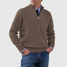 Men's half zip sweater featuring a tailored fit, designed for all-season wear with pilling-resistant knit fabric, perfect for a stylish and comfortable look. 1