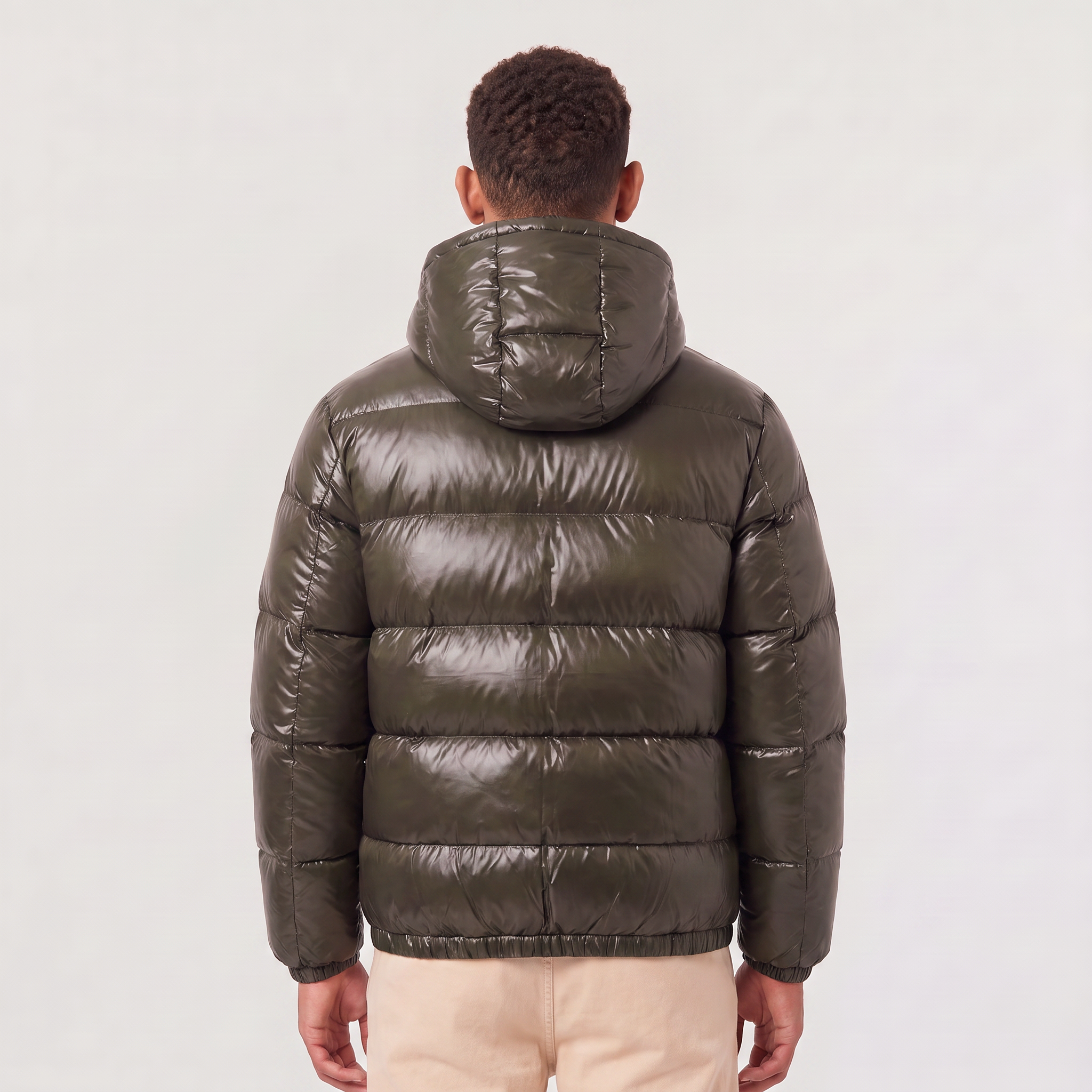 Men's hooded puffer jacket featuring zip pockets and a glossy quilted finish, designed for a relaxed fit, perfect for winter wear. 3