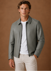 Men's jacket featuring a full-zip closure and side pockets, designed with a classic leather look for a stylish and versatile outerwear option. 0